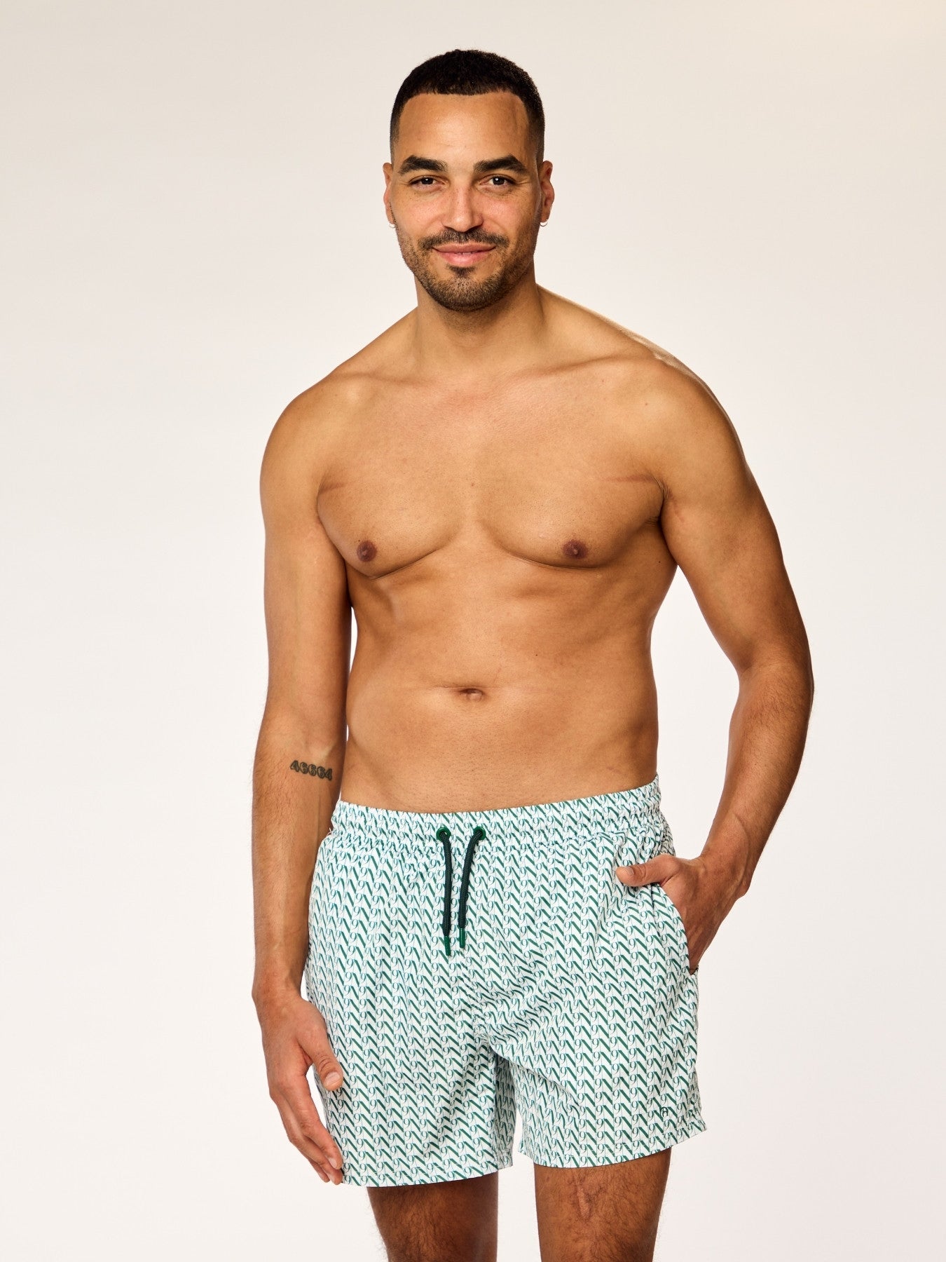 EOS - Swim Shorts • Dark Green Monogram